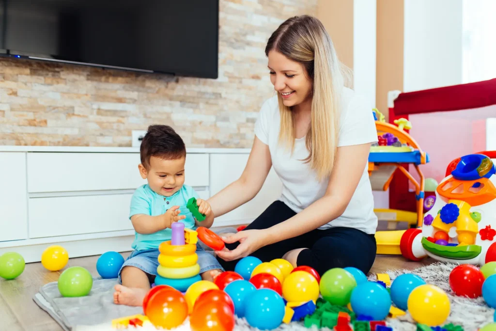 a woman working in childcare benefiting from school and childcare booking systems