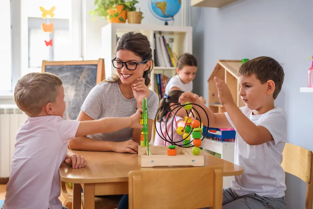 children playing in a classroom