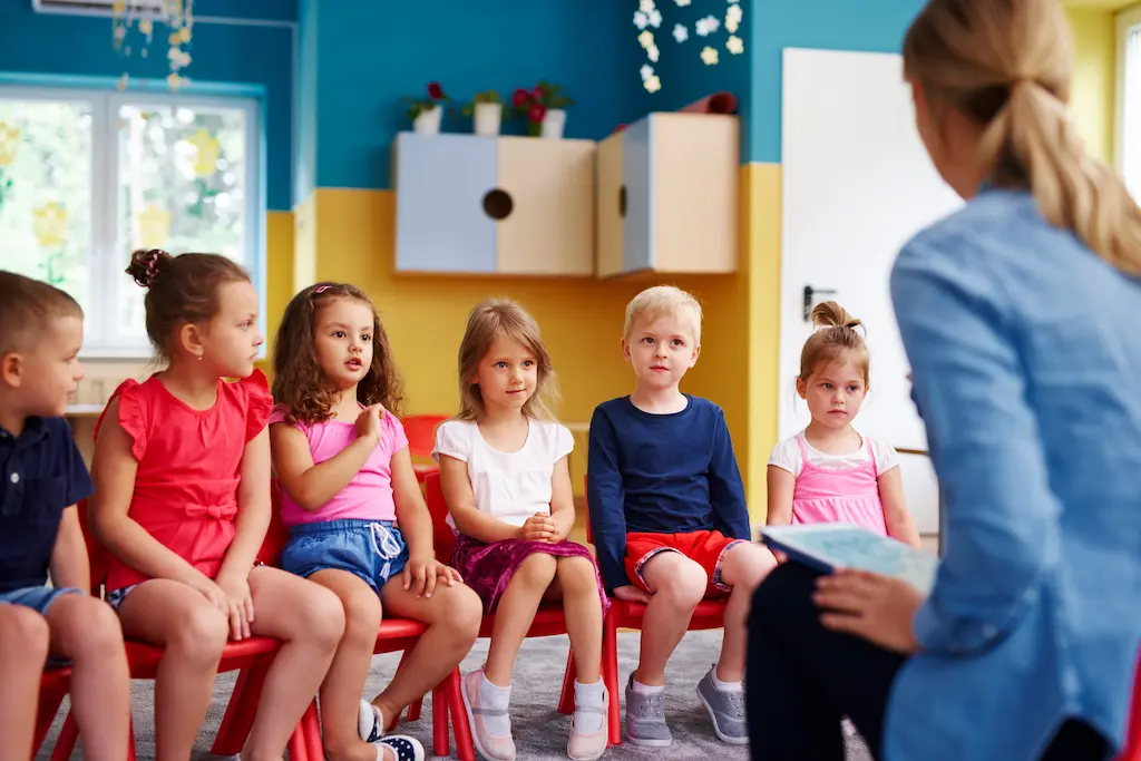 a childcare provider teaching children