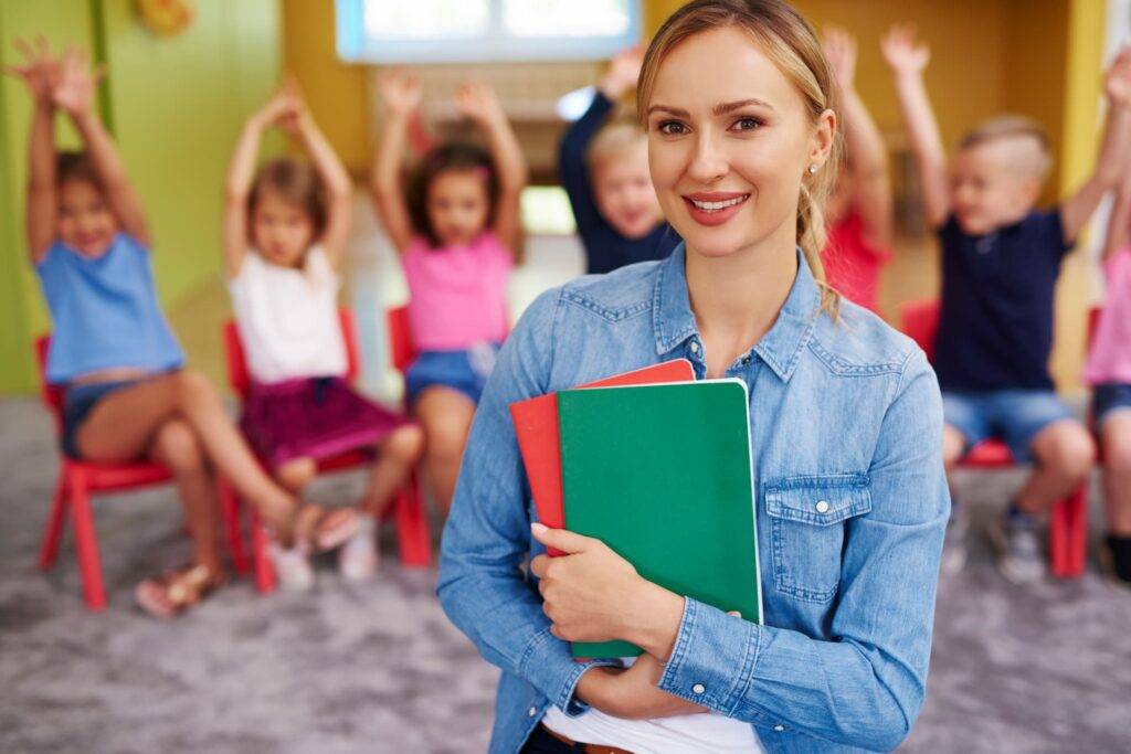 a teacher in a classroom with children